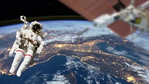 Astronaut & Satellite View From Space Stock Footage