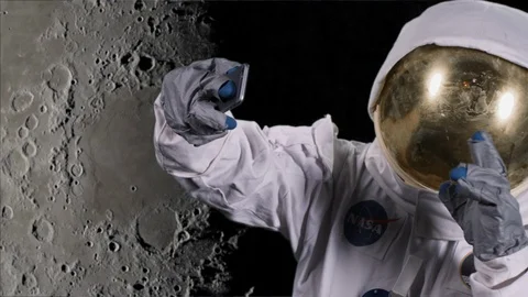 Astronaut selfie in front of moon Video stock 108515339