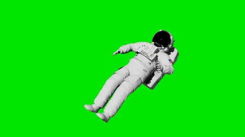 Astronaut soars on a green background. Stock Footage 108612065
