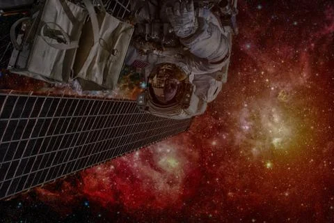 Astronaut on space mission. Elements of this image furnished by NASA. Stock Photos