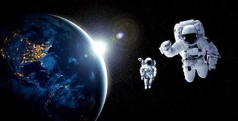 Astronaut spaceman do spacewalk while working for space station Foto stock