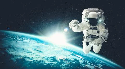 Astronaut spaceman do spacewalk while working for spaceflight mission Stock Photos