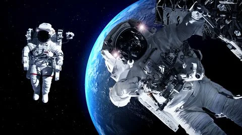 Astronaut spaceman do spacewalk while working for spaceflight mission Stock Photos