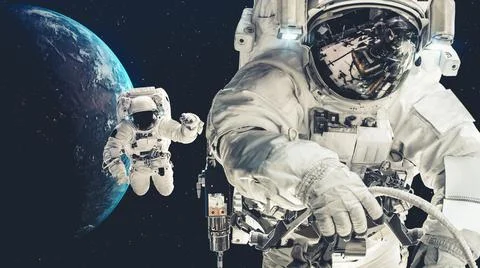 Astronaut spaceman do spacewalk while working for spaceflight mission Stock Photos