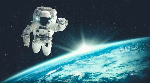 Astronaut spaceman do spacewalk while working for spaceflight mission Stock Photos