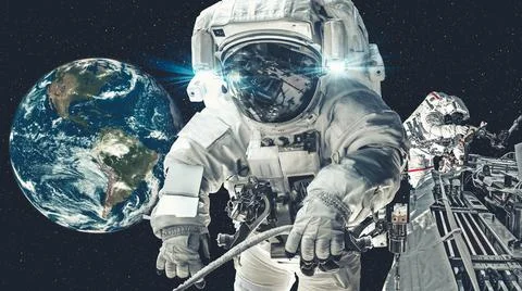 Astronaut spaceman do spacewalk while working for spaceflight mission Stock Photos