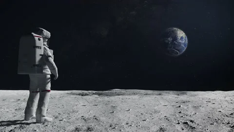 Astronaut spaceman in outer space looking at the Earth globe planet moon surface 스톡 동영상 220212559