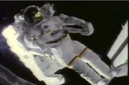 An Astronaut Is Suspended In Space, And The Basic Stats Of His Space Suit Stock Footage