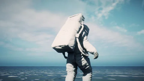 Astronaut walking carefully In The Ocean Stock-Footage 240409234