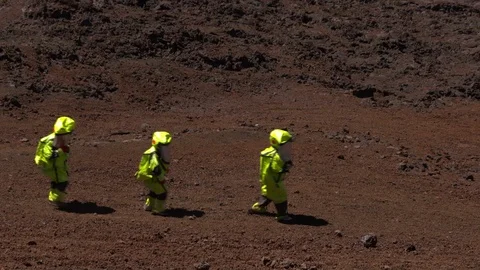 Astronaut walking together in mars simulated landscape Stock Footage 93533135