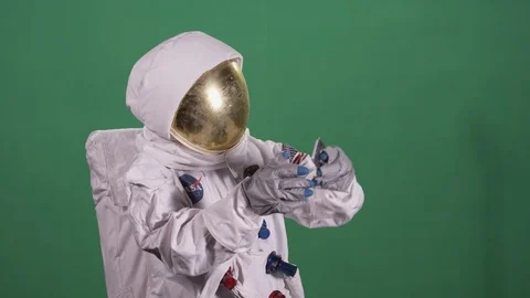 Astronaut waving on facetime green screen Stock Footage 109180296