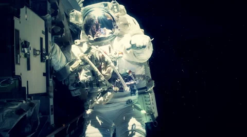Astronaut working on a space station Stock Footage 41798314