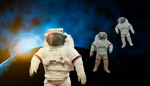 Astronaut working on space with sun light with earth and cosmos background Stock-Fotos