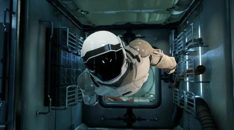 An astronaut in zero gravity checks the module of his spaceship. 3D Rendering. Stock Illustration