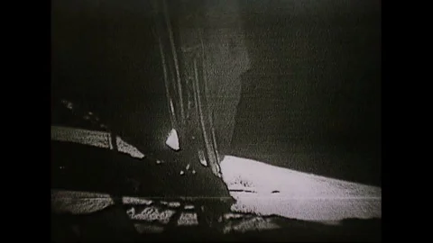 Astronauts from Apollo 11 walk on the moon as people watch everywhere on earth. Stock Footage 123371316