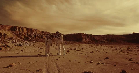 Astronauts discussing base location on Mars Stock Footage 155545442