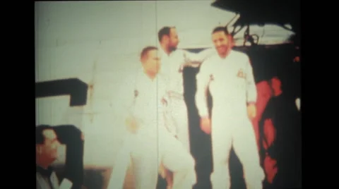 Astronauts getting out of helicopter and technicians preparing spacecraft launch Stock Footage 39912594