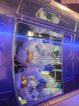 Astronauts inside the capsule. Stock Photos