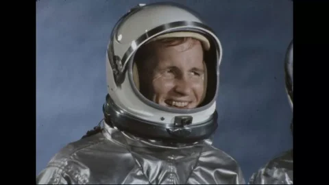 Astronauts James McDivitt and Ed White with western style hat on helmet - 1964 Stock Footage 101919194