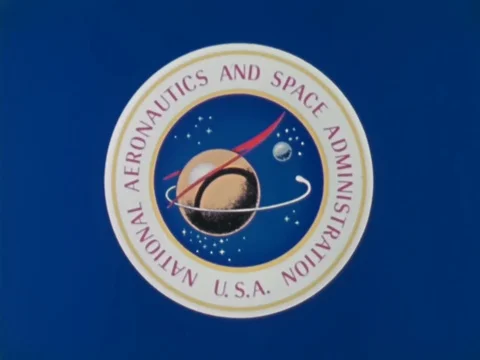 Astronauts John Watts Young, Thomas Kenneth Mattingly and Charles Moss Duke eat Stock Footage 79458637