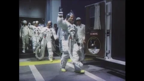 Astronauts Michael Collins, Neil Armstrong and Buzz Aldrin boarding transfer bus Stock Footage 269506592