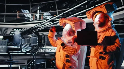 Astronauts operating starship control interface react to alien presence Stock Footage 311135189
