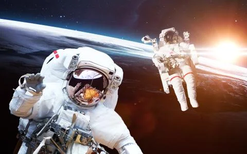 Astronauts in outer space Stock Photos