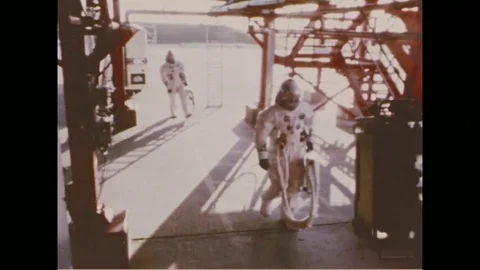 Astronauts in space suit prepare for Apollo 7 mission - 1968 Video stock 104334157