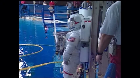 Astronauts train for a mission in space with a weightless simulator. Stock Footage 123372370