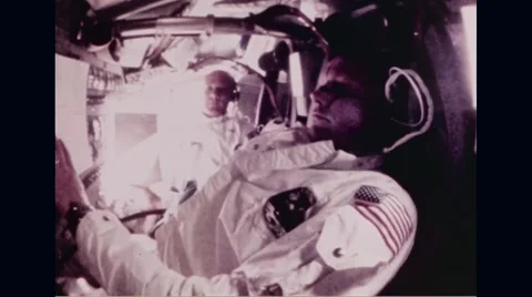 Astronauts working in Apollo 11 spacecraft Stock Footage