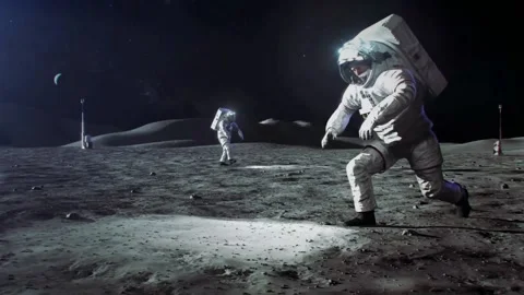 Astronauts working on the Moon. Elements of this video furnished by NASA Stock Footage 224781595