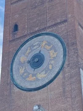 Astronomical clock on the Torrazzo bell tower displaying zodiac signs and R.. Stock Photos