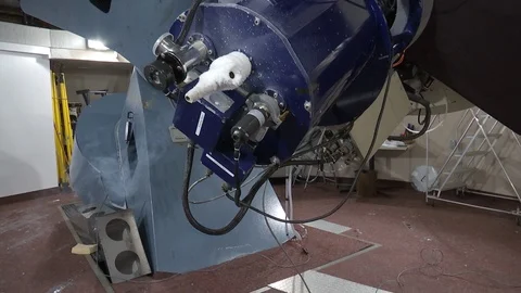 Astronomical telescope being tested in observatory Stock Footage 100173331