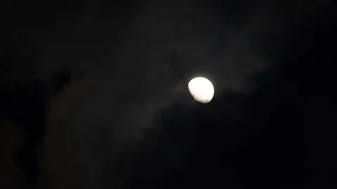 Astronomy concept, full of glowing yellow moon with clouds. Vidéo 188745676