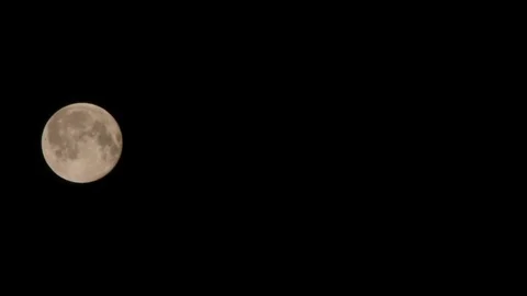 Astronomy concept. Observing the full moon motion over the sky. Stock Footage 77745290