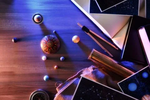 Astronomy exploration concept with table with retro objects Stock Photos