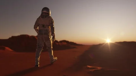 Astronut walking on the surface of planet Mars Stock Footage 270460380