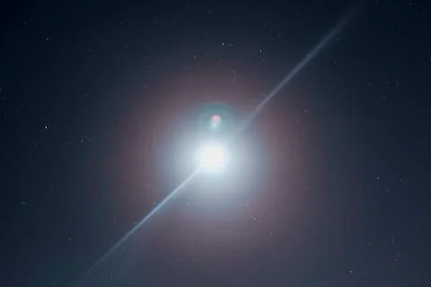 Astrophotography of The Moon and The Stars Lit up with Lens Flare Stock Photos