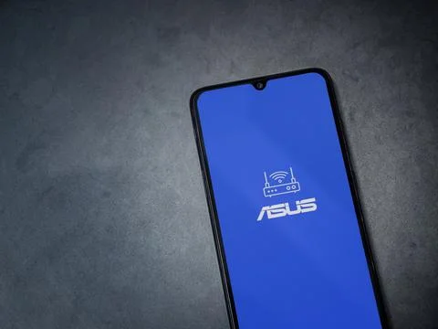 ASUS Router app launch screen on smartphone on dark marble stone background Stock Photos