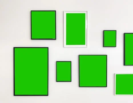 Asymmetric gallery wall arrangement with frames filled with green chroma key Stock Photos