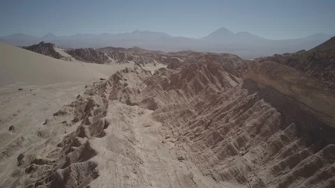 Atacama Mars Valley Valle de la Luna Chile drone view people sand skiing Stock Footage 112363776