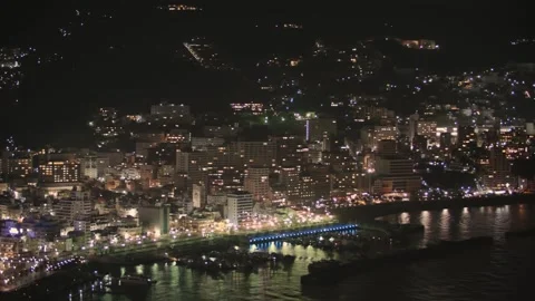 Atami Night View: A Journey Through the Hot Spring Town and Bread from Left to Stockbeeldmateriaal 333152841