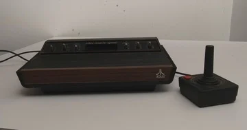 Atari 2600 Video Game System with Joystick Stock Footage 85712295