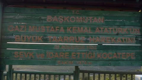 Ataturk statue and the waving Turkish flag at sunrise in Kocatepe Stock Footage 292877458