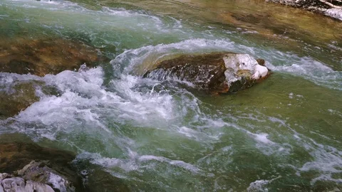 The Aterno river flows among the rocks Stock Footage 126031146