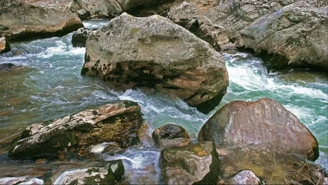 The Aterno river flows among the rocks Stock Footage 126055348