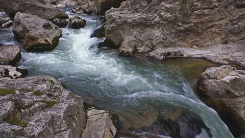 The Aterno river flows among the rocks Stock Footage 126062704