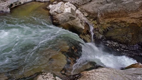 The Aterno river flows among the rocks Stock Footage 126091943