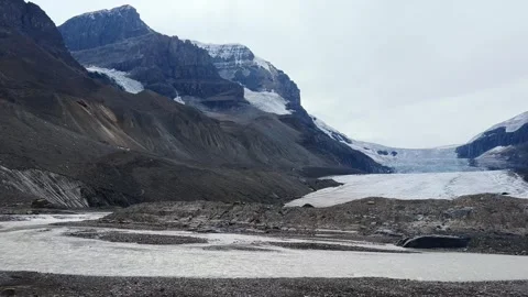 Athabasca glacier with torrent stream Video stock 302552913
