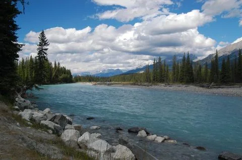 AthabascaRiverandClouds Stock Photos
